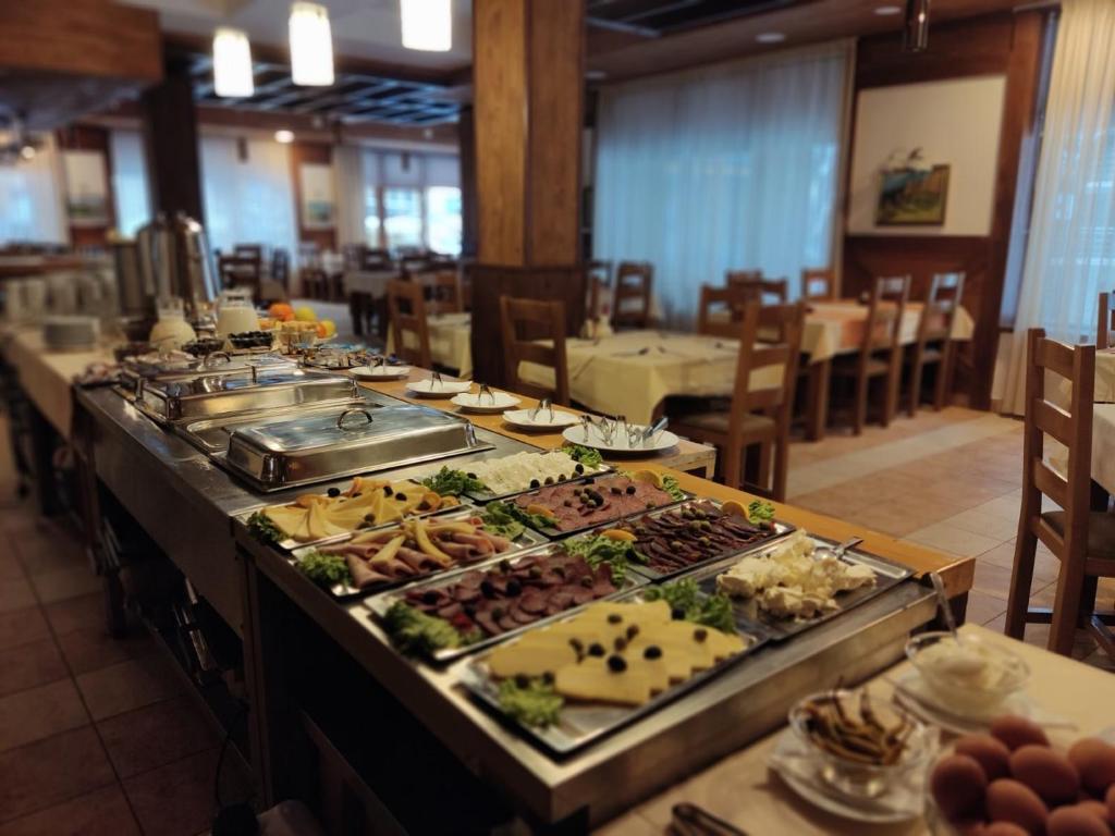 Zima na Vlašiću nikada nije bila ljepša – uživajte u vrhunskoj usluzi, toplini doma i čarobnom zimskom ambijentu Ville Ugar 3*!