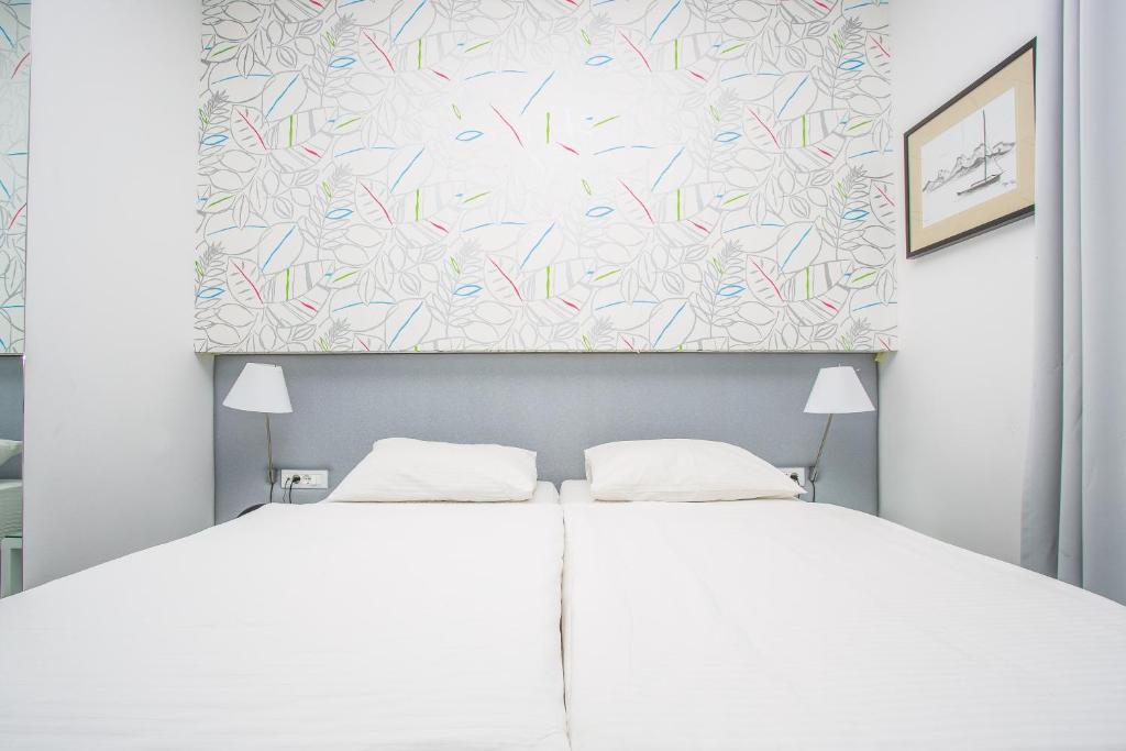 Jona Rooms Podstrana – uživajte u savršenom spoju mediteranskog ugođaja, blizine mora i elegantnog smještaja za odmor ispunjen uživanjem!