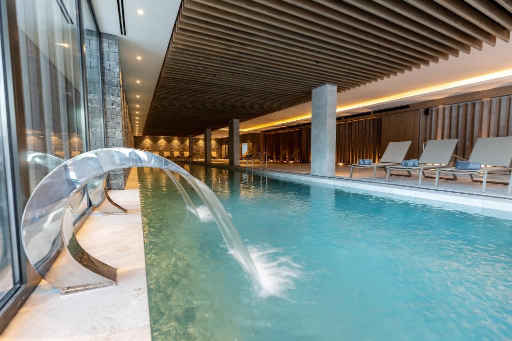 Doživite čaroliju Igmana i uživajte u udobnosti i miru koje nudi Hotel Monti Spa & Wellness 4* – idealno mjesto za potpuni odmor!